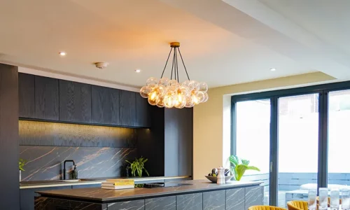 warm glow LED bulbs in a bubble chandelier above a kitchen island