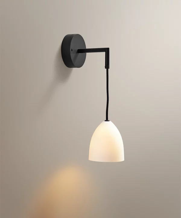 modern scandi minimalist porcelain wall light on a neutral backdrop
