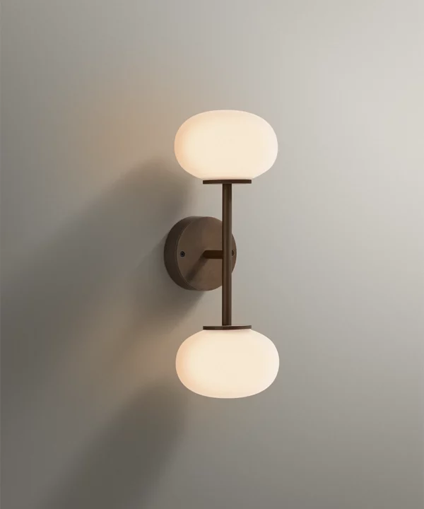 two bulb metal wall light in antique brass