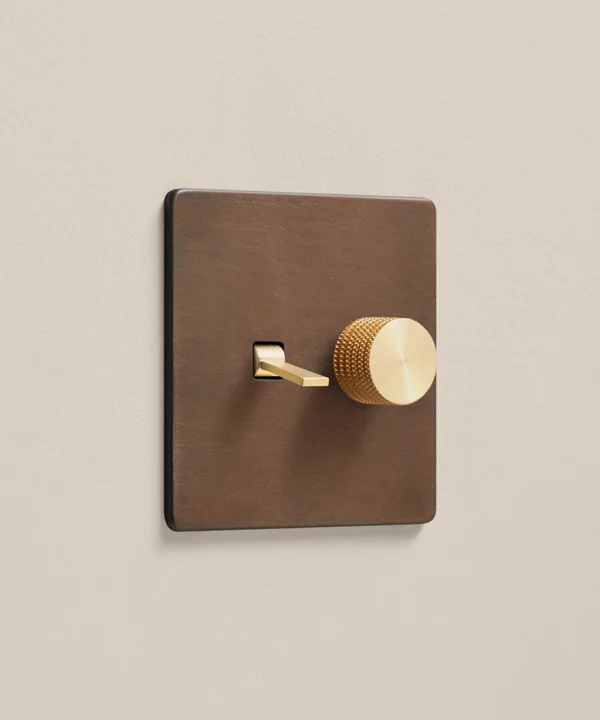 bronze two gang double light switch combination with 1 toggle, 1 dimmer