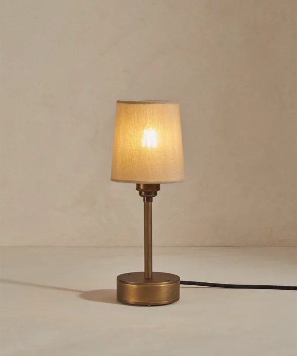 small industrial table lamp with metal base and linen shade