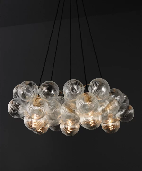 fluted glass pendant light with a cloud of ribbed glass baubles