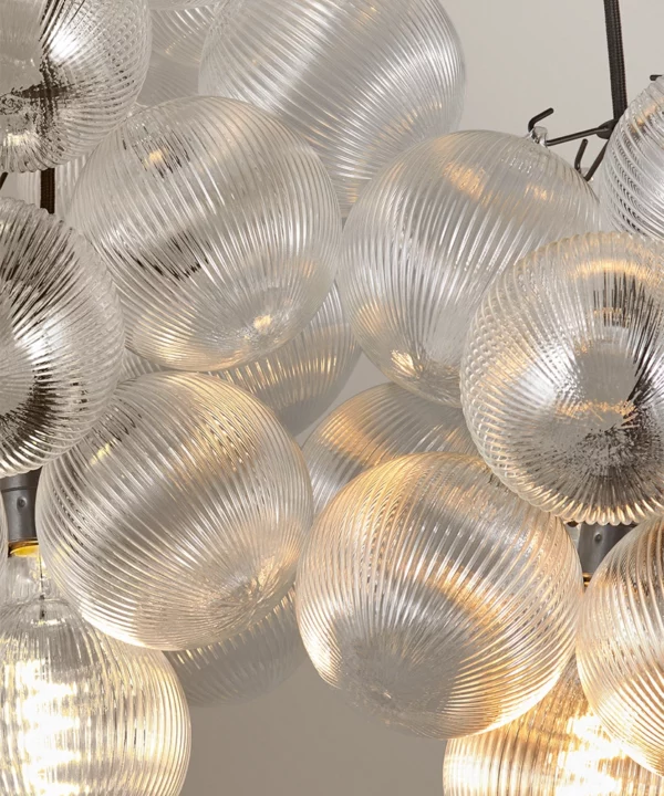 close up shot of fluted baubles on bubble light chandelier