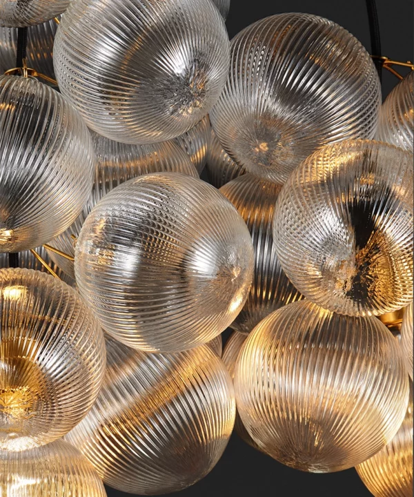 macro shot of ribbed baubles on a bubble light lit up