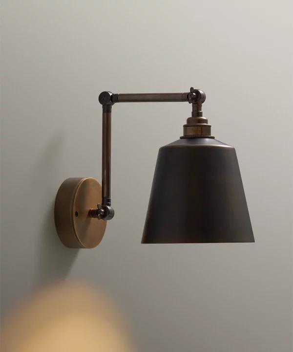 Fender adjustable wall light in Brewer's Brass with matching hand spun bell shaped metal shade