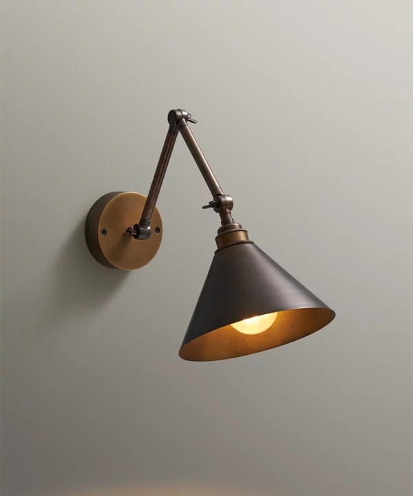 Fender adjustable wall light with hand spun metal shade
