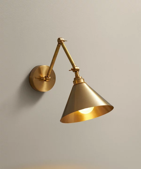 gold wall light with gold metal lamp shade