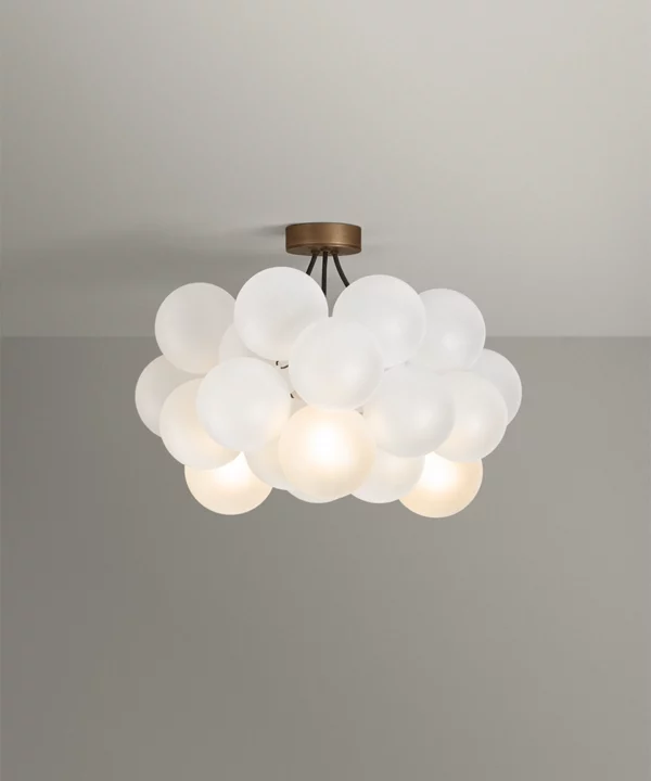 semi-flush bubble light chandelier in antique brass with frosted baubles