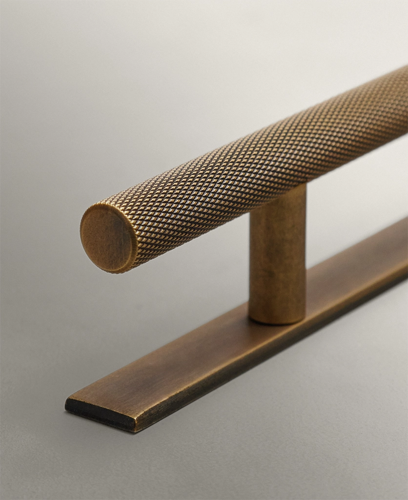 antique brass knurled handle with back plate