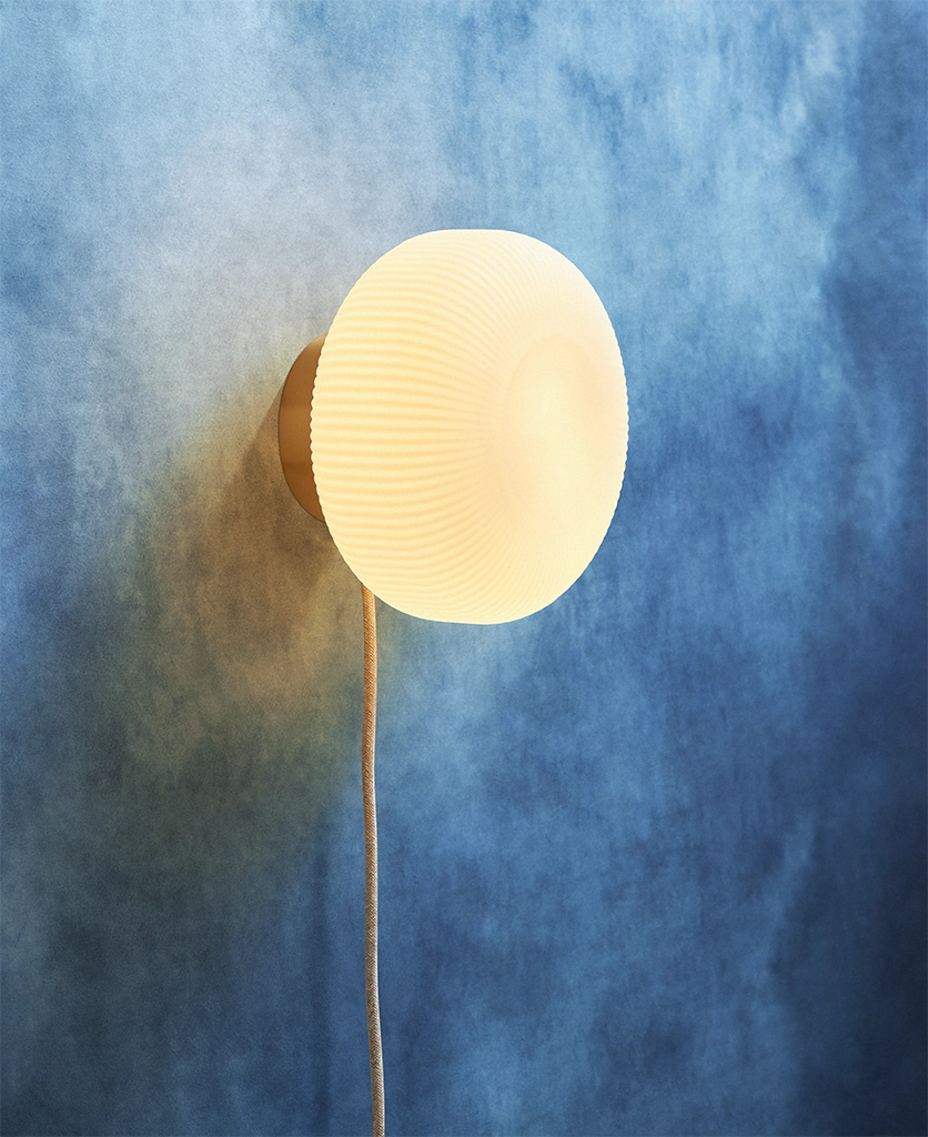 Gold Nuvia frosted plug in wall light