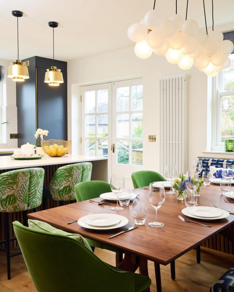 frosted bubble chandelier above a dining table 