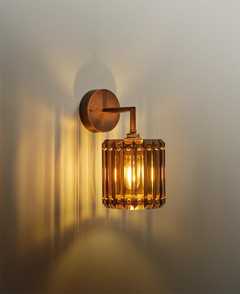 Brewer's Brass wall light with tobacco crystal shade